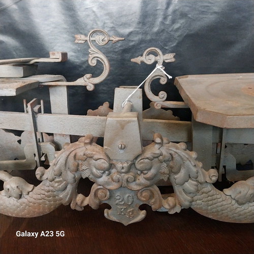 Cast iron antique scale used with lion and dragon decorations