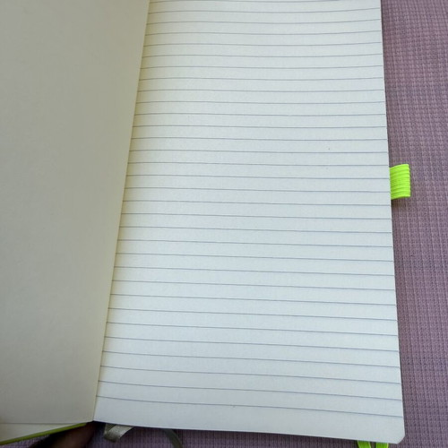 Lined notebook with cover defect