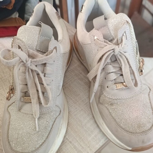 Seven women's shoes size 40 used with visible marks