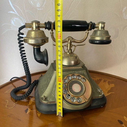Vintage telephone device used, decorative antique