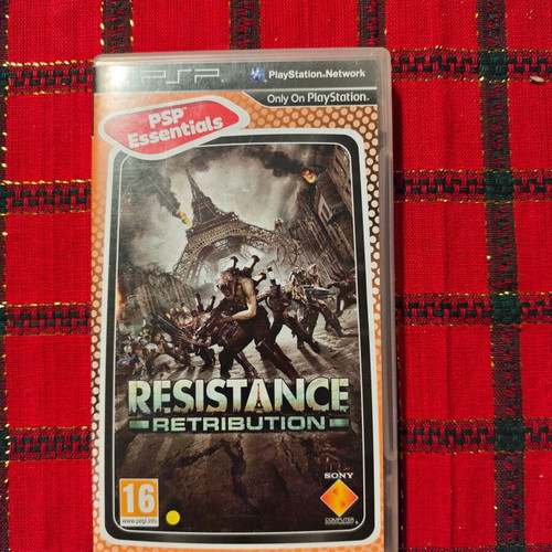 Resistance: Retribution PSP game used with booklet