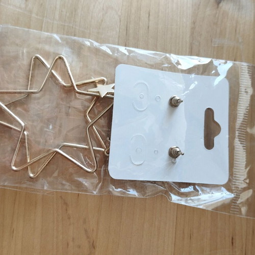 Earrings like new, gold color, in sealed package