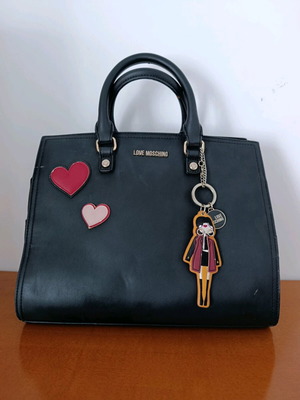 Love Moschino black hand bag like new with charms