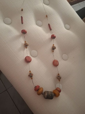 Long necklace new with silver cylinder in coral orange colors