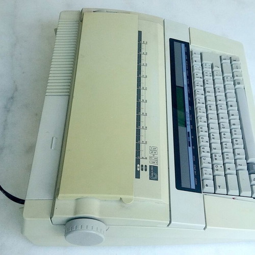 Nakajima AX-65 portable electronic typewriter used, Greek-English