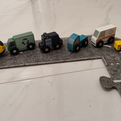 Racetrack with wooden vehicle figures like new