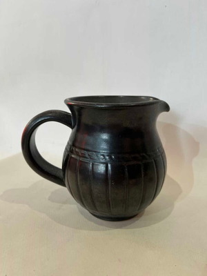 Vintage clay serving jug used, dark brown shade