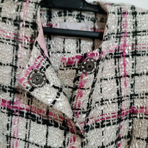 Coat used, no collar, fastens with studs, size M, white multicolor