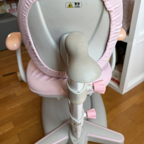 Adjustable pink ergonomic children's study chair with footrest