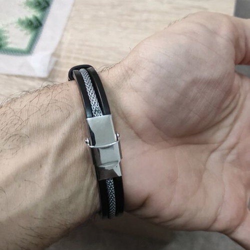Stainless Steel Bracelet like new with gold chain and black rubber band