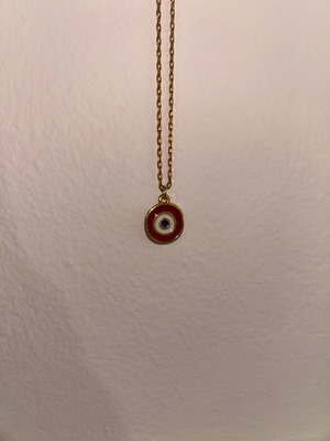 Evil eye necklace like new in gold, red, white, and blue colors