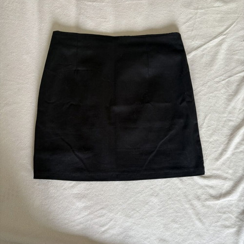 Mini black skirt with left hem detail