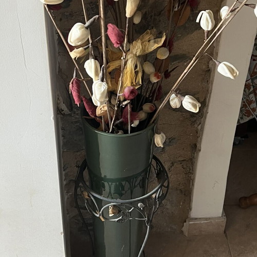 Large vintage floor decoration with dried flower arrangement