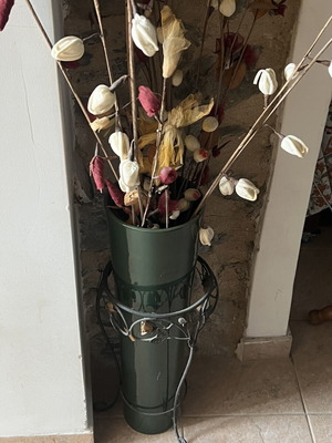 Large vintage floor decoration with dried flower arrangement