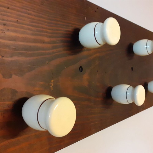 Wooden wall hanger with handles from old barber shaving brushes