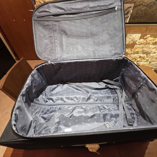 Carpisa 28" Travel Suitcase used, black semi-rigid fabric