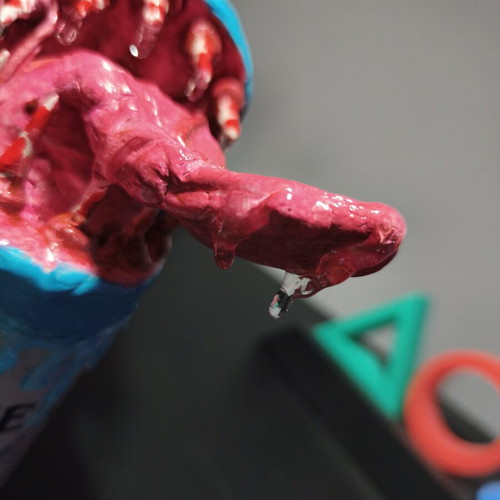 Handmade monster figure from Monster can with clay and UV resin