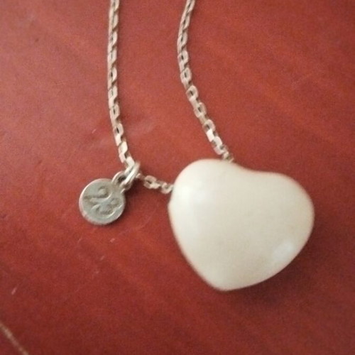 Silver delicate necklace like new with heart pendant and thin chain