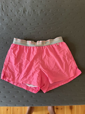 Med men's swim shorts used, pink, medium size