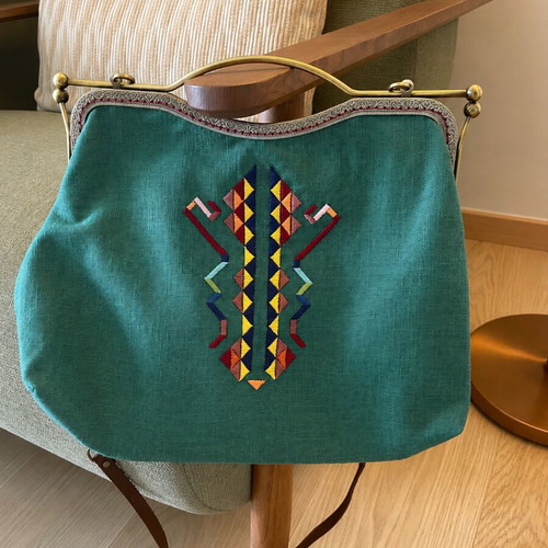 Curly Mary crossbody bag like new, multicolor and green