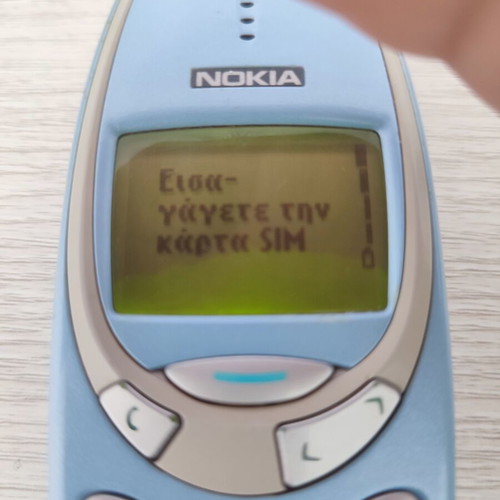 Nokia 3310 Classic Phone turquoise used with charger