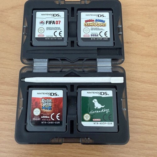 Nintendo DS game set with 4 PAL/EUR cartridges, EA Sports case, and stylus like new