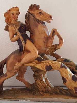 Horse figurine with woman hunter used