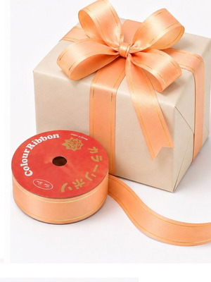 Decorative Curling Ribbon 10m x 1.6cm, soft orange with gold detail