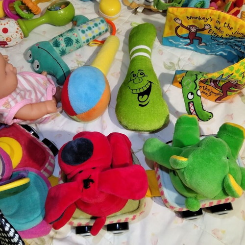 Baby rattles and toys used, set of multiple pieces