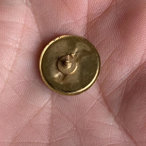 Gold-plated pin badge 'Nike of Samothrace' used