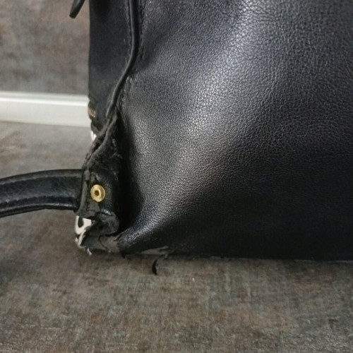 Guess backpack used with leather cracks