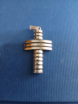 Modern men's cross with glossy finish like new