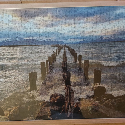 Framed puzzle like new, dimensions 0.53x0.73 m