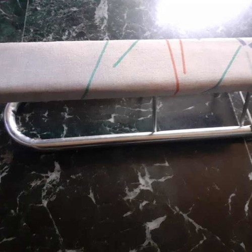 Small ironing board used for details, sleeves and collars