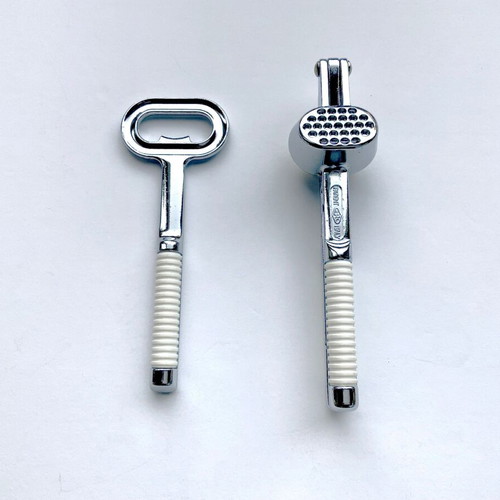 Pedrini P.P.L. garlic press and bottle opener set used