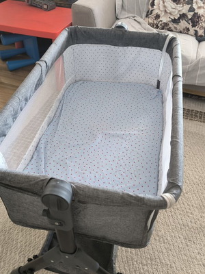 Baby Cot like new with mattress, wheels, shelf, and mosquito net