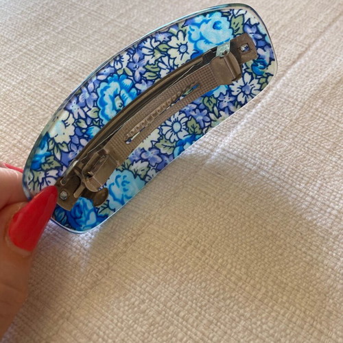 Hair clip like new with blue floral pattern