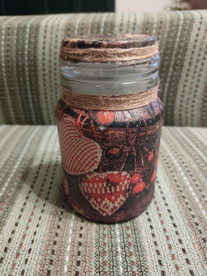 Glass jar with lid, decoupage decoration and raw twine
