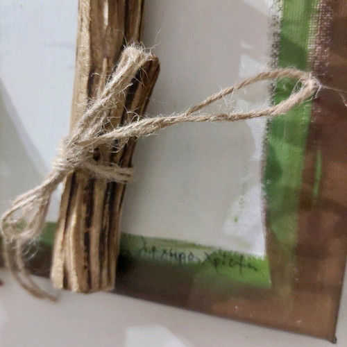 Handmade mixed media wall art with natural materials and metal leaves like new
