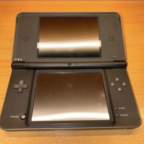 Nintendo Dsi XL like new with Nintendogs card, charger, and stylus