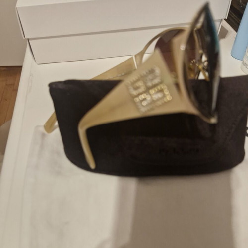 Givenchy sunglasses used, gold color
