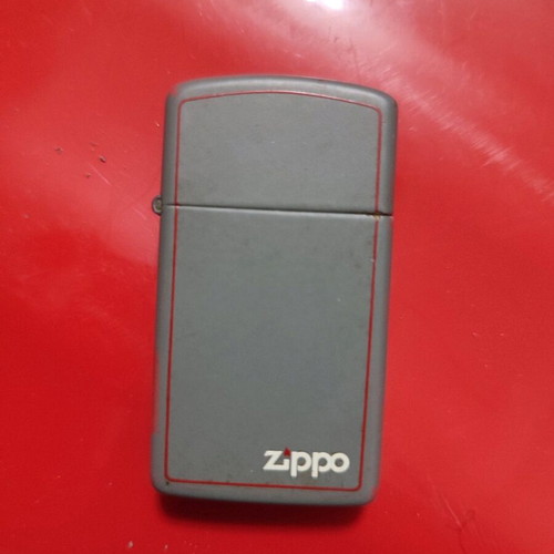 Slim Zippo lighter used, collectible (1989)
