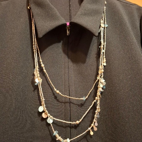 Necklace new in beige and pink shades
