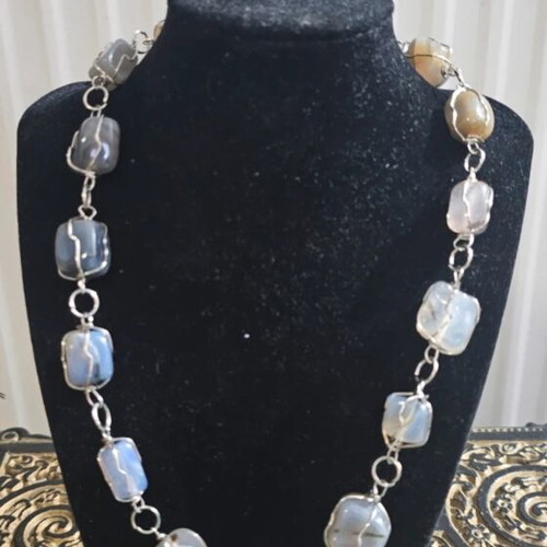 Necklace with metal setting