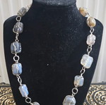 Necklace with metal setting