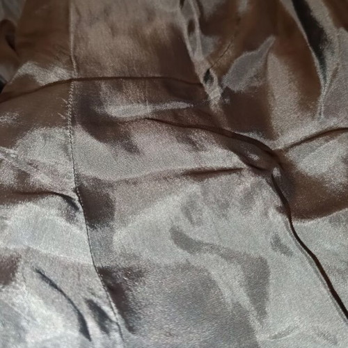 Velvet coat used with arm openings and gift bag