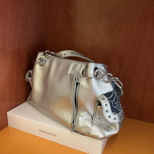 Shoulder bag silver, like new, bought abroad
