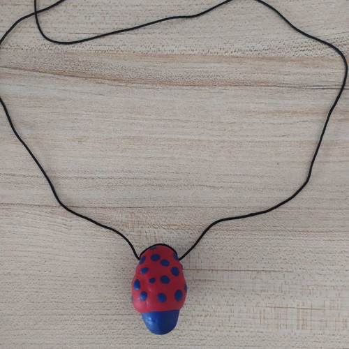 FIMO necklace used with red and blue mushroom design