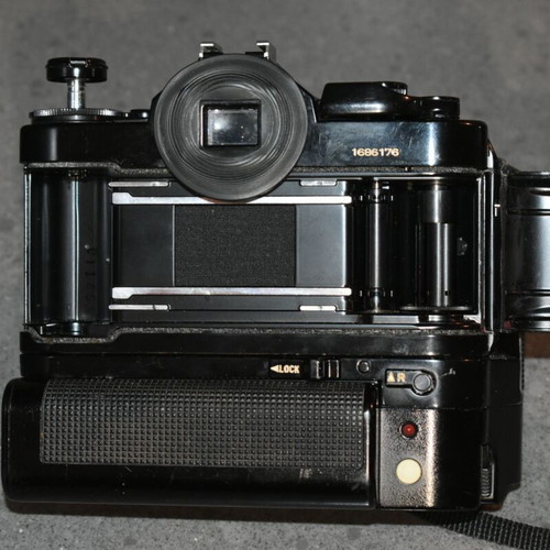Canon A-1 collectible pack like new with Motor Drive, strap and 35mm f/2.8, 135mm lenses