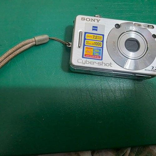 Sony Cyber-shot DSC-W70 digital camera with battery and charger